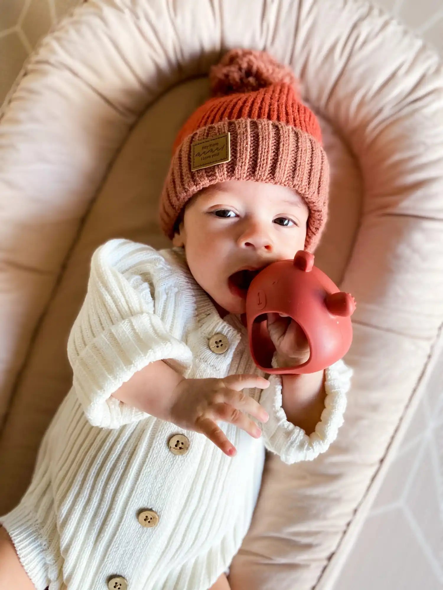 Teething Mitten Glove teething toy Dummy Clip Silicone Bear - Teether Mitt Baby constantly chewing on hands, can't quite grasp objects just yet? These teething mitten gloves are perfect as a first Teether. Made from all silicone, they are lightweight, easy to keep clean and perfect to soothe those gums. Slip over baby's hand for them to grasp the internal bar and watch baby self soothe those teething woes.ย The Little bear ears and arms are textured on the back giving that extra soothing effect.