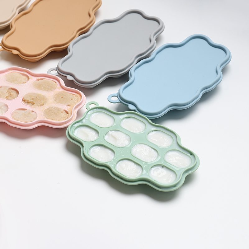 Silicone Frozen Food Tray - 10 Compartments Preparing food for you little ones made easy with our silicone food trays. These 10 compartment moulds make the perfect portion. Simply fill the moulds and pop it in the freezer of fridge. Sizing pairs perfectly with our silicone feeders. Made from food grade silicone, easy to clean and dishwasher safe. You can use for food storage or as a nipple tray for your little ones to explore new foods. Perfect for purees or water.