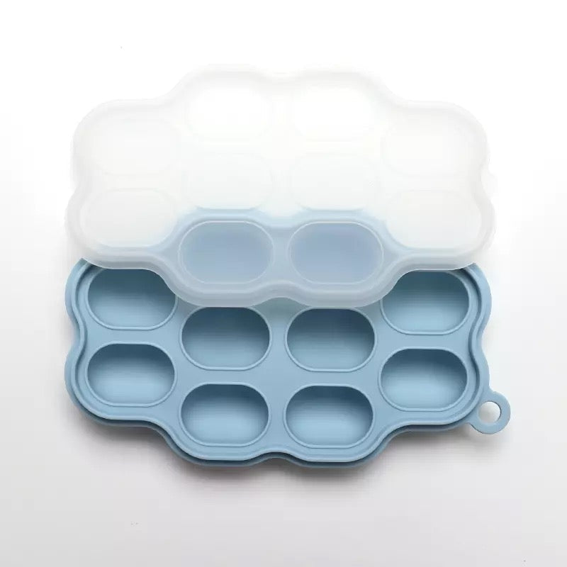 Silicone Frozen Food Tray - 10 Compartments Preparing food for you little ones made easy with our silicone food trays. These 10 compartment moulds make the perfect portion. Simply fill the moulds and pop it in the freezer of fridge. Sizing pairs perfectly with our silicone feeders. Made from food grade silicone, easy to clean and dishwasher safe. You can use for food storage or as a nipple tray for your little ones to explore new foods. Perfect for purees or water.