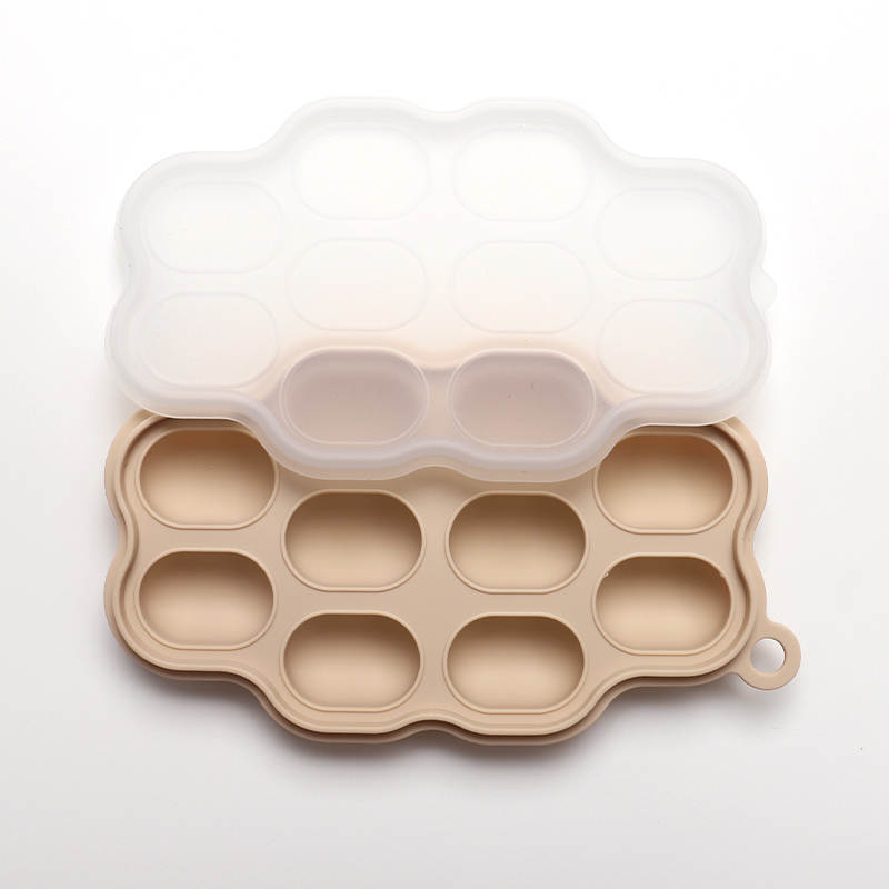 Silicone Frozen Food Tray - 10 Compartments Preparing food for you little ones made easy with our silicone food trays. These 10 compartment moulds make the perfect portion. Simply fill the moulds and pop it in the freezer of fridge. Sizing pairs perfectly with our silicone feeders. Made from food grade silicone, easy to clean and dishwasher safe. You can use for food storage or as a nipple tray for your little ones to explore new foods. Perfect for purees or water.