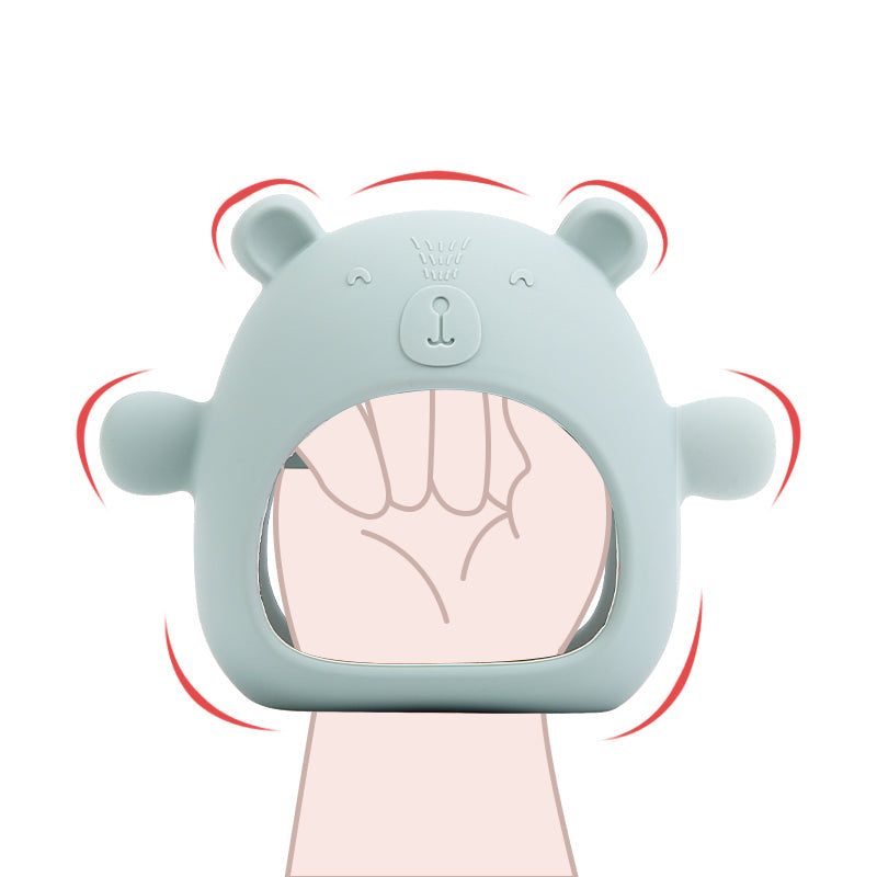 Teething Mitten Glove Silicone Bear - Teether Mitt Baby constantly chewing on hands, can't quite grasp objects just yet? These teething mitten gloves are perfect as a first Teether. Made from all silicone, they are light weight, easy to keep clean and perfect to sooth those gums. Slip over baby's hand for them to grasp the internal bar and watch baby self sooth those teething woes. The Little bear ears and arms are textured on the back giving that extra soothing affect.