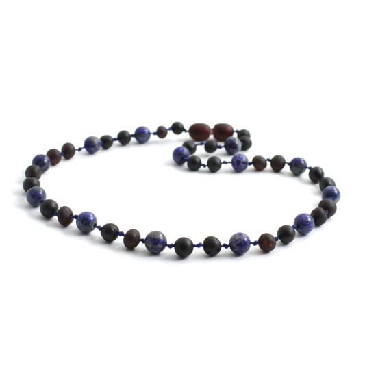 Amber Necklace Cherry, Cherry Raw & Lapis Lazuli | Baby 32cm Our Amber necklaces imported directly from Lithuania, the home of Baltic Amber and the Baltic Sea, where they are beautiful handmade. Baltic Amber necklaces help with teething symptoms as well as looking great. Amber beads are a great natural solution to assist your child through the misery of teething!