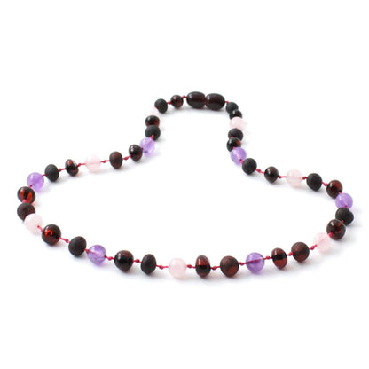 Amber Necklace Cherry Rose Quartz & Amethyst | Baby 32cm Our Amber necklaces imported directly from Lithuania, the home of Baltic Amber and the Baltic Sea, where they are beautiful handmade. Baltic Amber necklaces help with teething symptoms as well as looking great. 