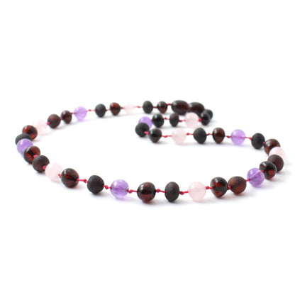 Amber Necklace Cherry Rose Quartz & Amethyst | Baby 32cm Our Amber necklaces imported directly from Lithuania, the home of Baltic Amber and the Baltic Sea, where they are beautiful handmade. Baltic Amber necklaces help with teething symptoms as well as looking great. 