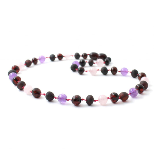 Amber Necklace Cherry Rose Quartz & Amethyst | Baby 32cm Our Amber necklaces imported directly from Lithuania, the home of Baltic Amber and the Baltic Sea, where they are beautiful handmade. Baltic Amber necklaces help with teething symptoms as well as looking great. 