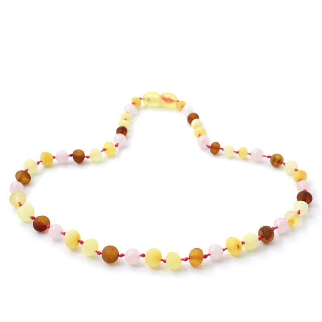 Amber Necklace Multi amber raw and Rose Quartz Baby 32cm Our Amber necklaces imported directly from Lithuania, the home of Baltic Amber and the Baltic Sea, where they are beautiful handmade. Baltic Amber necklaces help with teething symptoms as well as looking great.