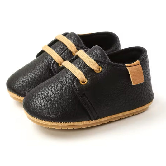 Casey Lace Up Shoes - Black Step into style with our adorable lace up tan baby shoes