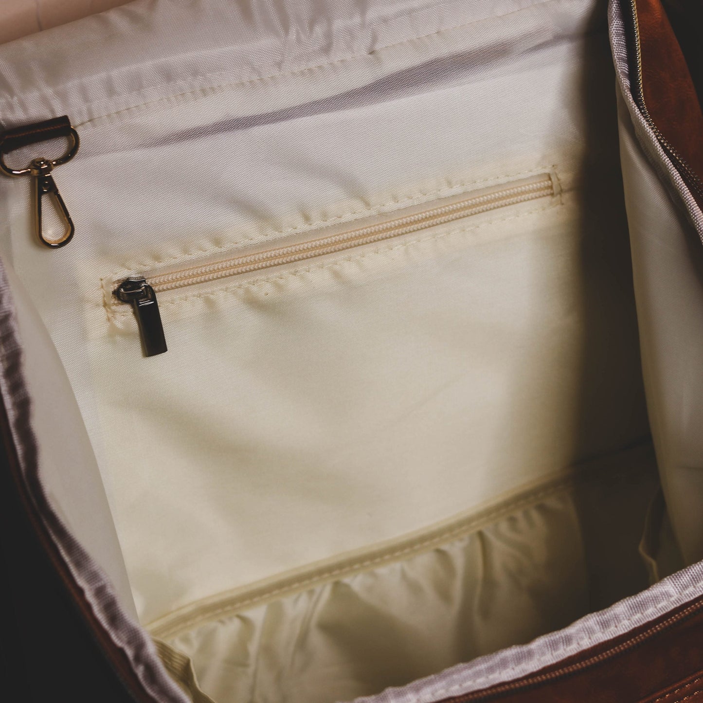 Faux Leather Nappy Bag Backpack - Luxe Tan Brown Our Faux Brown Leather Nappy Bag adds a sophisticated look to an everyday essential, stylish, functionality for everyday use. Nappy bag backpacks are an essential part of the babies haul when leaving the house – A Must have! An Amazing quality, so soft to touch, multi functional backpack, perfect for busy parents.