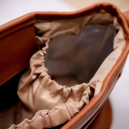 Pram Caddy Pram Caddy Organiser Faux Leather - Tan Pram caddy organisers keep everything you need close at hand, whilst keeping you hands-free. Our Pram Caddy is made from high-quality faux leather