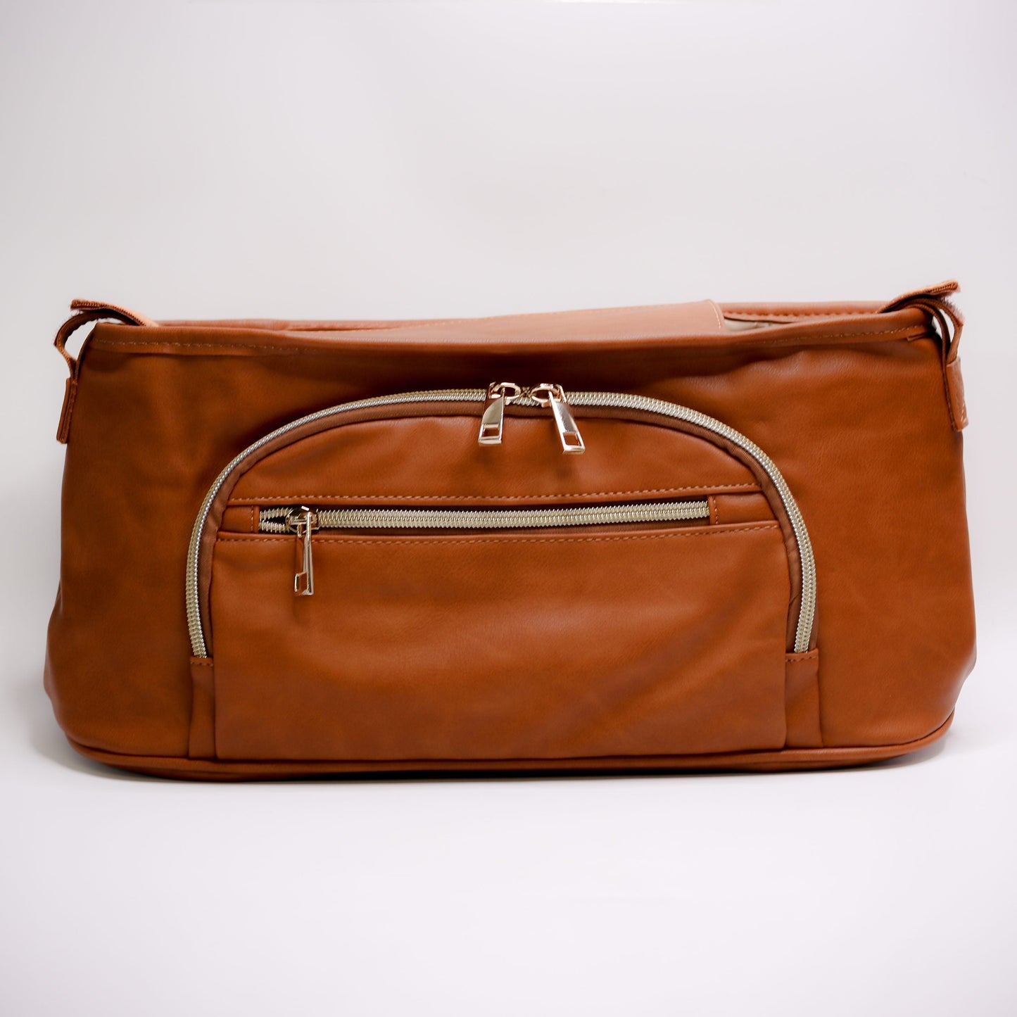Pram Caddy Pram Caddy Organiser Faux Leather - Tan Pram caddy organisers keep everything you need close at hand, whilst keeping you hands-free. Our Pram Caddy is made from high-quality faux leather