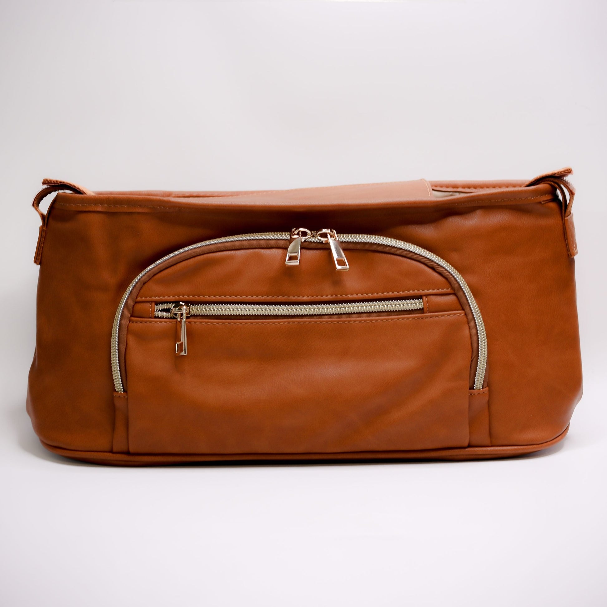 Pram Caddy Pram Caddy Organiser Faux Leather - Tan Pram caddy organisers keep everything you need close at hand, whilst keeping you hands-free. Our Pram Caddy is made from high-quality faux leather