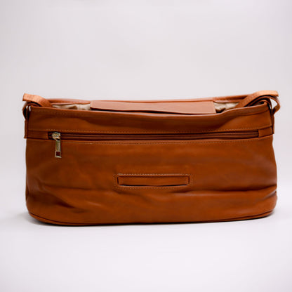 Pram Caddy Pram Caddy Organiser Faux Leather - Tan Pram caddy organisers keep everything you need close at hand, whilst keeping you hands-free. Our Pram Caddy is made from high-quality faux leather