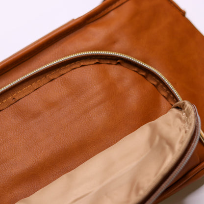 Pram Caddy Pram Caddy Organiser Faux Leather - Tan Pram caddy organisers keep everything you need close at hand, whilst keeping you hands-free. Our Pram Caddy is made from high quality faux leather