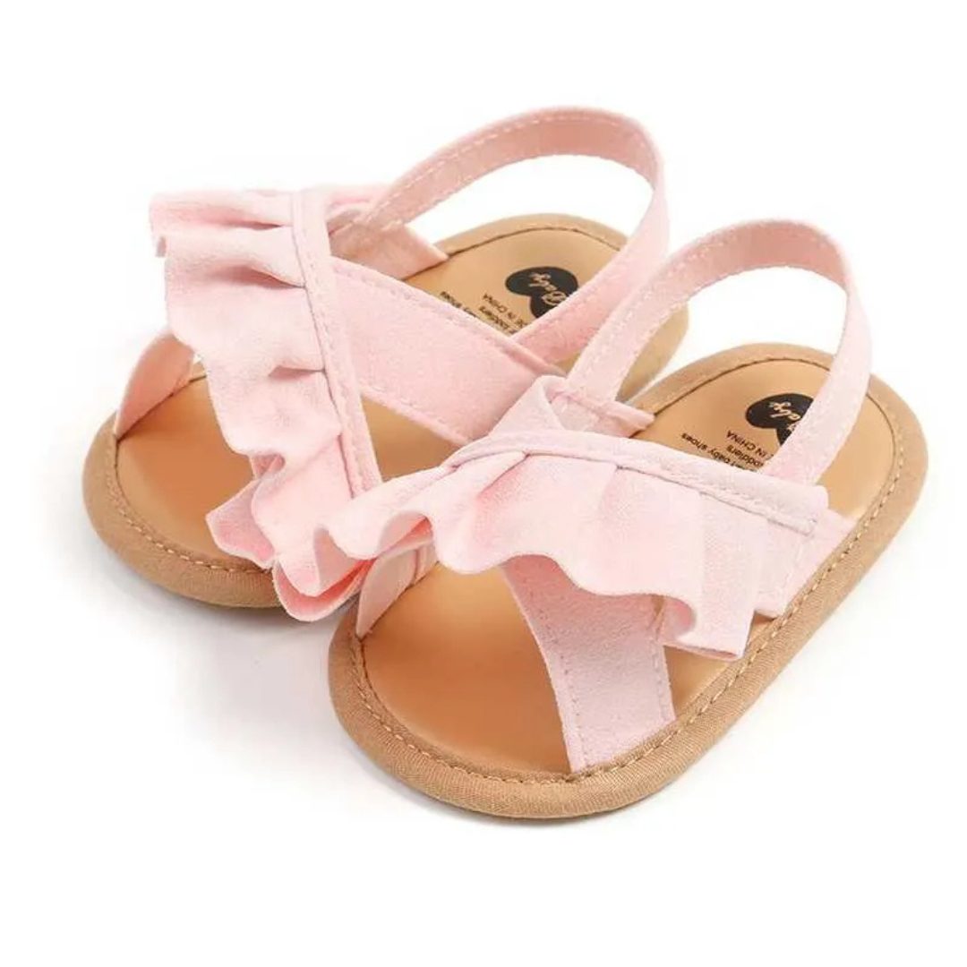 Rosalie Ruffle Baby Shoes - Pink Step into summer with our adorable pink baby sandals adorned with charming ruffles