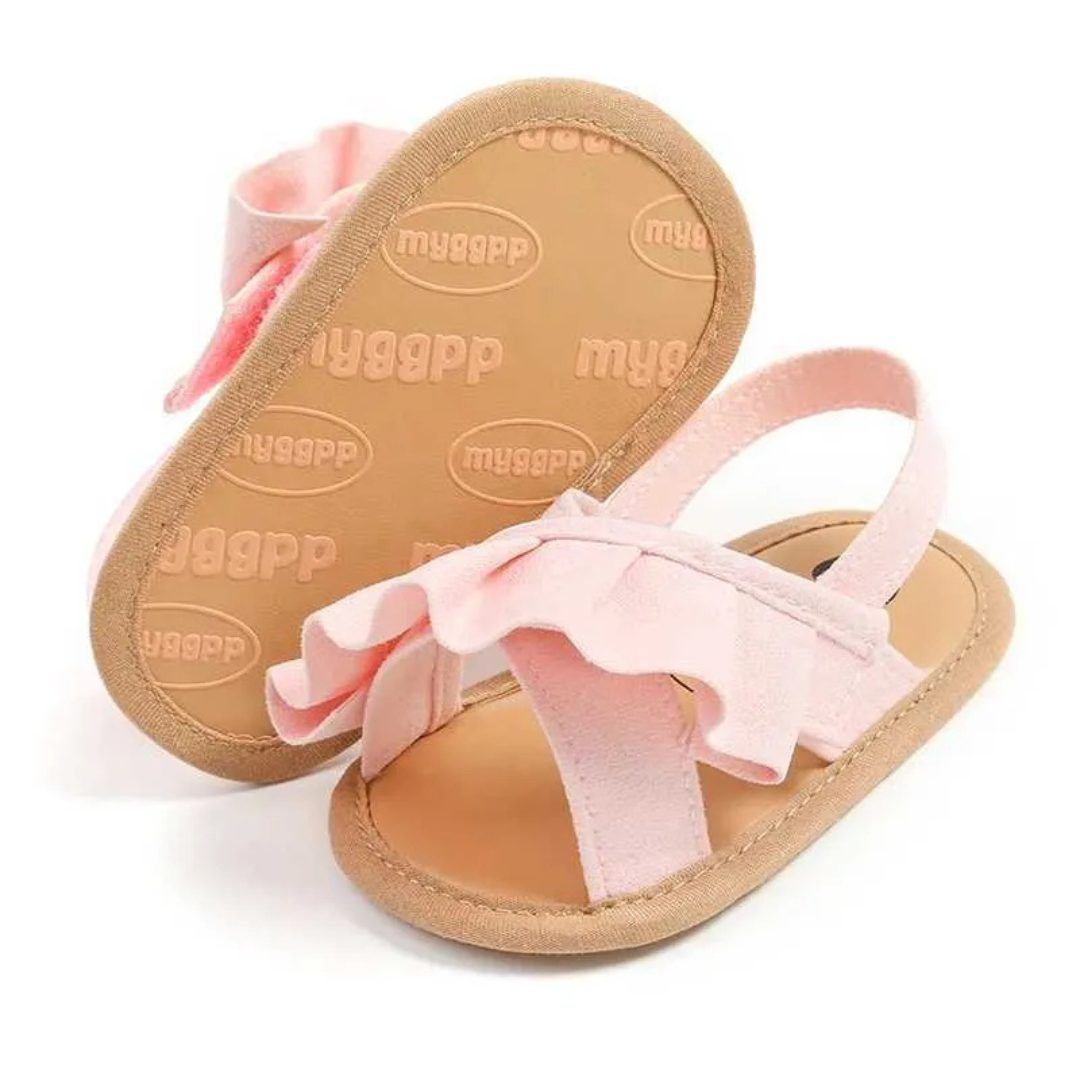 Rosalie Ruffle Baby Shoes - Pink Step into summer with our adorable pink baby sandals adorned with charming ruffles