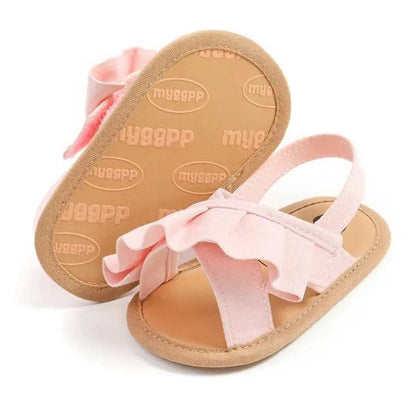 Rosalie Ruffle Baby Shoes - Pink Step into summer with our adorable pink baby sandals adorned with charming ruffles