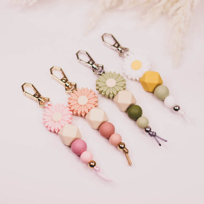 Silicone Bead Keychain - Daisy Pink Perfect as a thoughtful gift or a stylish accessory for yourself, these keychains offer a touch of personality and charm to your everyday essentials