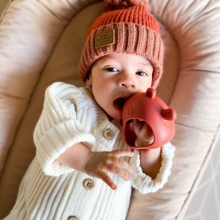 Teething Mitten Glove teething toy Dummy Clip Silicone Bear - Teether Mitt Baby constantly chewing on hands, can't quite grasp objects just yet? These teething mitten gloves are perfect as a first Teether. Made from all silicone, they are lightweight, easy to keep clean and perfect to soothe those gums. Slip over baby's hand for them to grasp the internal bar and watch baby self soothe those teething woes.  The Little bear ears and arms are textured on the back giving that extra soothing effect.