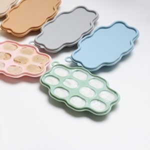 Silicone Frozen Food Tray - 10 Compartments Preparing food for you little ones made easy with our silicone food trays. These 10 compartment moulds make the perfect portion. Simply fill the moulds and pop it in the freezer of fridge. Sizing pairs perfectly with our silicone feeders. Made from food grade silicone, easy to clean and dishwasher safe. You can use for food storage or as a nipple tray for your little ones to explore new foods. Perfect for purees or water. 