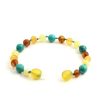 Amber Bracelet Multi Raw & Turquoise | Baby 14cm Our Amber bracelets imported directly from Lithuania, the home of Baltic Amber and the Baltic Sea, where they are beautiful handmade. Baltic Amber bracelets help with teething symptoms as well as looking great on baby. Amber beads are a great natural solution to assist your child through the misery of teething! These are not designed to be chewed or mouthed in any way. It's believed that when worn against the skin, heated by body temperature, the beads release natural oil (succinic acid) that are absorbed, soothing aches and pains. They have been used through the centuries for healing, pain relief and to boost the bodies immune system. Zebra Babies necklaces are lightweight and comfortable for your child to wear and they look great. Each Amber purchase comes beautifully packaged with a storage pouch. Inside the tags are all the care and safety information also. We think of the environment when packaging our amber and try to reduce plastic packaging. Baltic Amber and Gemstones. Length: 14cm approx. It’s always recommended to measure before your purchase.  Check out our FAQ All Our necklaces and Bracelets are beaded and knotted Safety Information Amber beads are designed to be worn and not chewed. The necklaces should only be worn under supervision and not when your child is sleeping. Each bracelet has been carefully handcrafted with your babies safety in mind. Knots between each bead mean that if the necklace is broken, only one bead will come off. A special clasp will release the necklace if too much pressure is applied. Each bead is carefully rounded and polished to be comfortable against your child's skin. Amber resin is not cold to touch and should not annoy your child when first worn (gemstone will be slightly cooler than room temperature) . We offer a 6 month warranty on all Amber Jewellery. Each Amber piece is individual and colours can change slightly. Please note each piece is handmade and sizes may vary slightly. Raw vs Polished? Our raw baltic amber is unpolished amber and is the true form of Baltic amber, uses less heat when processed, and contains more succinic acid. Full amber or amber and gemstones? Amber and gemstones look amazing and are a cute addition to our necklace. Gemstones provide their own benefits also. I do recommend more amber beads over gemstones for full affections but have a general feedback that both work amazing!