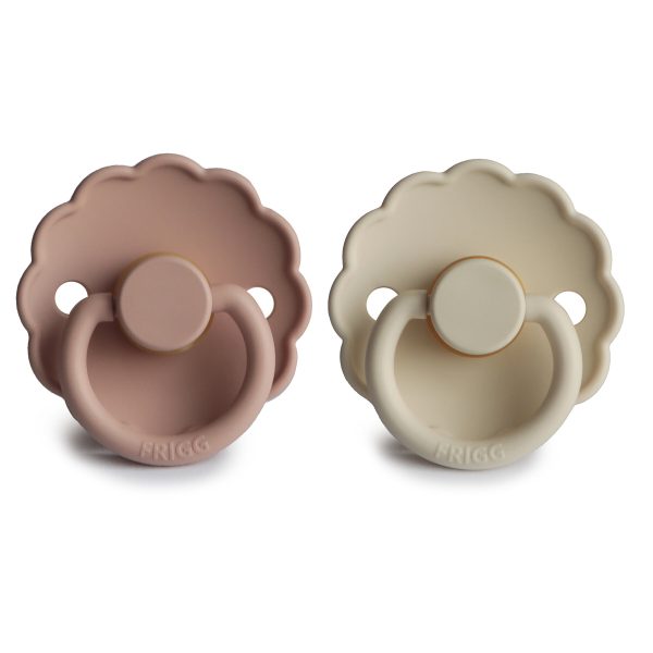 FRIGG DUMMIES The FRIGG dummies line of silicone pacifiers has been thoughtfully designed for your baby's comfort. The outward curve keeps the dummy