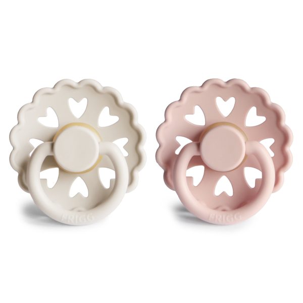 FRIGG DUMMIES The FRIGG dummies line of silicone pacifiers has been thoughtfully designed for your baby's comfort. The outward curve keeps the dummy