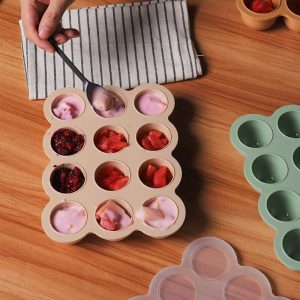 Silicone Feeder Frozen Food Tray - 12 Compartments Preparing food for you little ones made easy with our silicone feeder food trays. These 12 compartment moulds make the perfect portion. Simply fill the moulds and pop it in the freezer of fridge